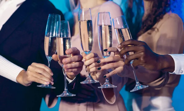 Unrecognizable People Clinking Glasses Celebrating New Year In Night Club
