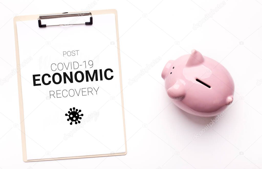 Post Covid-19 Economic Recovery. Conceptual Image With Piggy Bank And Clipboard