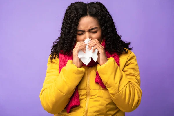 Sick African Woman Blowing Nose Sneezing In Tissue, Purple Background — Stock Photo, Image