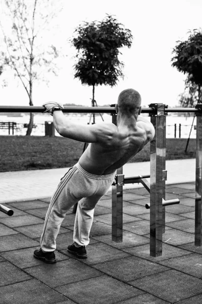 young man exercising on street .fitness, sport, training and lifestyle concept