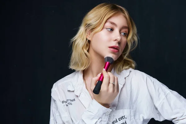 Beautiful Young Woman Applying Makeup Stock Picture