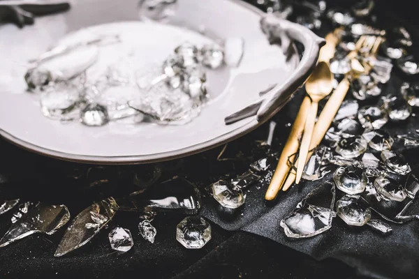 Plate Golden Utensils Crystals Broken Glass Black Background — Stock Photo, Image