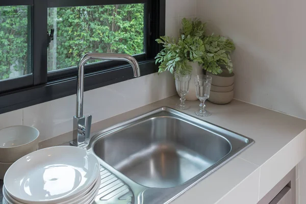 Sink with faucet in kitchen room — Stock Photo, Image