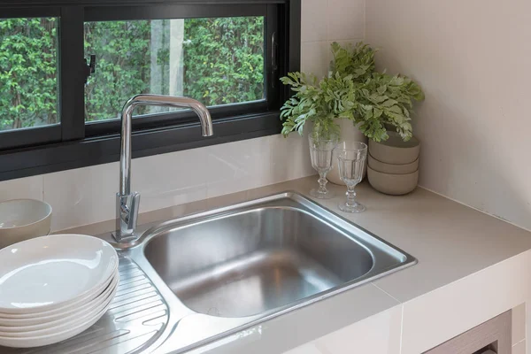 Sink with faucet in kitchen room — Stock Photo, Image