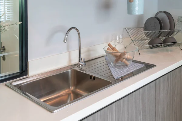 sink with faucet in kitchen room