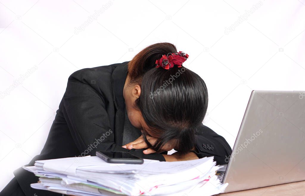 Office worker Sleep on the desk due to insufficient rest          