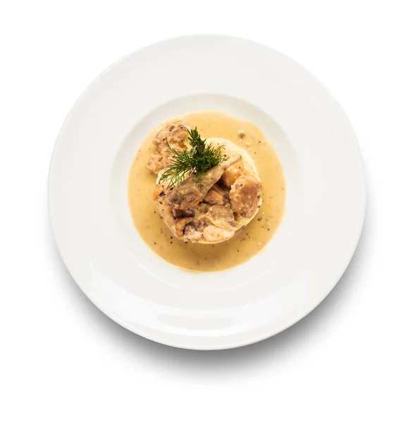 soslu patates püresi yuvarlak beyaz tabakta yan yemeği ile bıldırcın