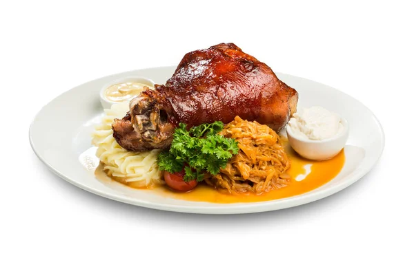 soslar ve bir koşucu haşlanmış lahana ve patates püresi ile kuzu pişmiş bacak