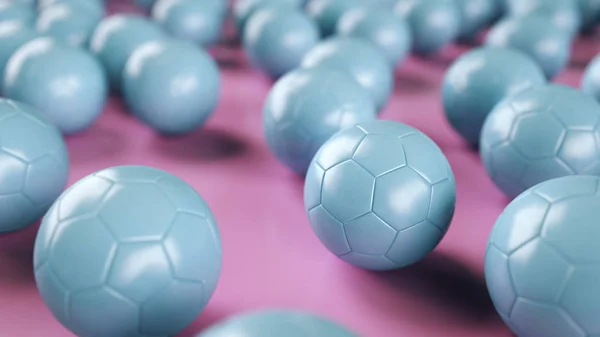 Blue soccer balls on pink surface — Stock Photo, Image