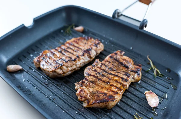 Two Grilled Steaks On a Grill Pan. Top View. — Stock Photo, Image