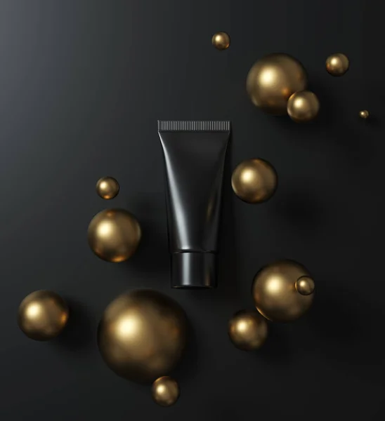 Czarna makieta produktu kosmetycznego - tuba kremowa leży na czarnej powierzchni wśród złotych kul — Zdjęcie stockowe