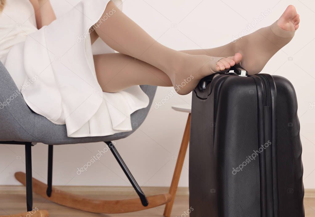 Varicose veins prevention, wearing Compression Stockings Thigh during flight