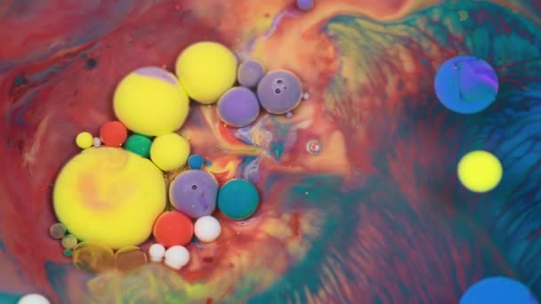 Abstract multicolored bubbles paint. Slow motion. Top view — Stock Video