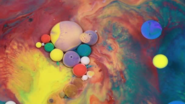 Abstract multicolored bubbles paint. Slow motion. Top view — Stock Video