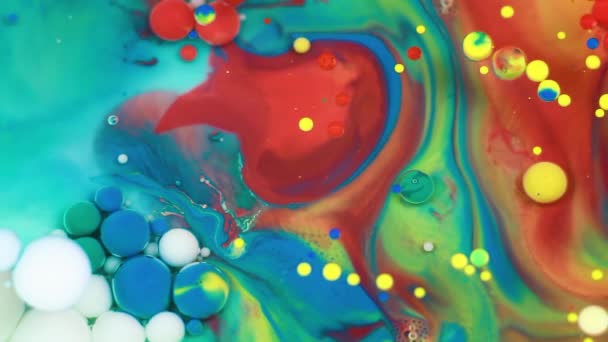 Abstract multicolored bubbles paint. Slow motion. Top view — Stock Video