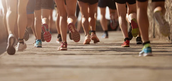 Marathon running race in the light of evening