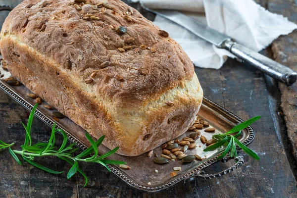 Home baked potato bread on rustic wooden table