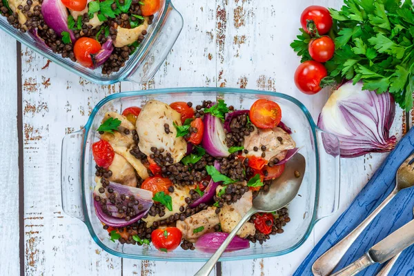 Chicken and cherry tomatoes bake with puy lentils - top view