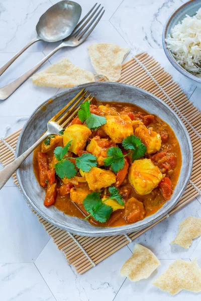 Fish Mappas - Kerala style coconut fish curry with rice. It's a popular dish in southern Indian state of Kerala. High angle view