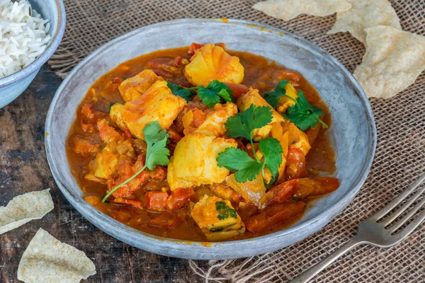 Fish Mappas - Kerala style coconut fish curry with rice. It\'s a popular dish in southern Indian state of Kerala.