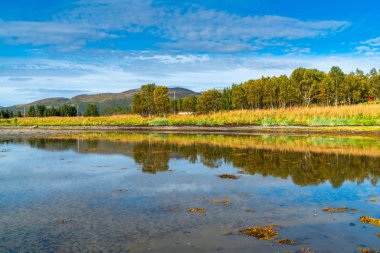Hakoya - the 3.69-square-kilometre island located in the Sandnessundet strait between the islands Kvaloya and Tromsoya in Troms county, Norway.