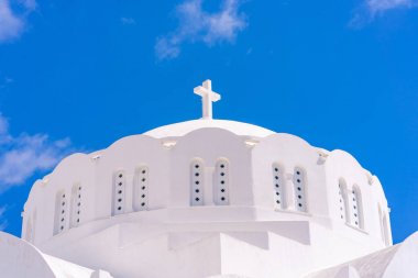 White dome of the Orthodox Metropolitan Cathedral in Fira, Santorini, Greece