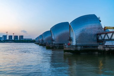 Thames Barrier, the world's second largest movable flood barrier. It protects London from environmental flooding from exceptionally high tides clipart