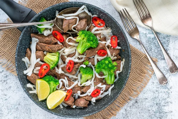 Beef and broccoli noodles - top view