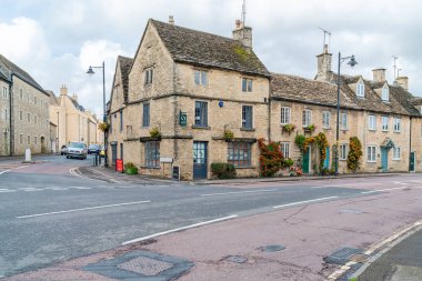 TETBURY, UK - SEPTEMBER 22, 2019: Tetbury is a small town and civil parish within the Cotswold district of Gloucestershire, England. The town is renowned for its antique and bric-a-brac shops clipart