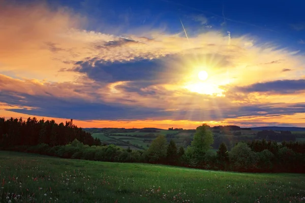 Green Meadow Sky Clouds Sunset Stock Image