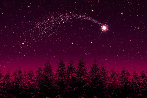 Christmas Star and red abstract sky.Christmas background.