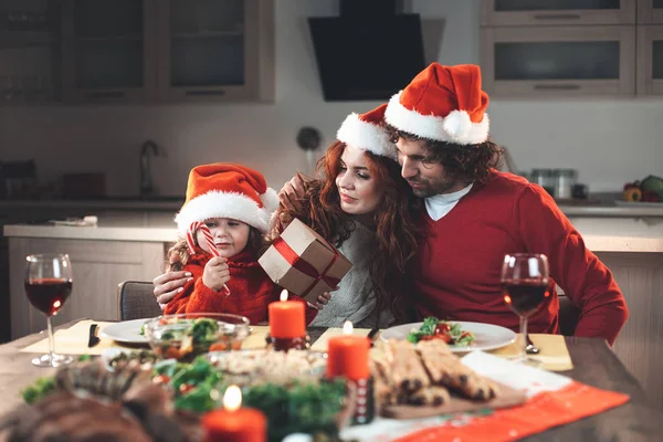 Happy family celebrating Christmas together at home — Stock Photo, Image