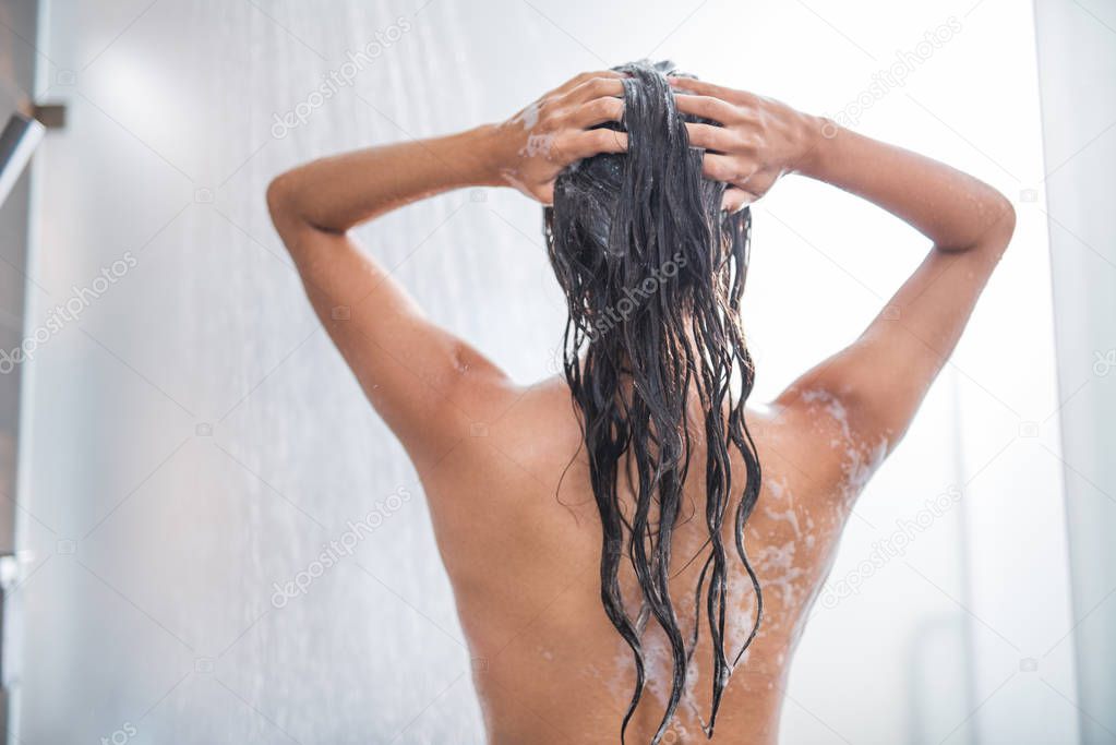 Woman lady under stream of water