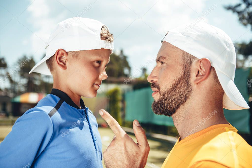 Orderly man telling with kid