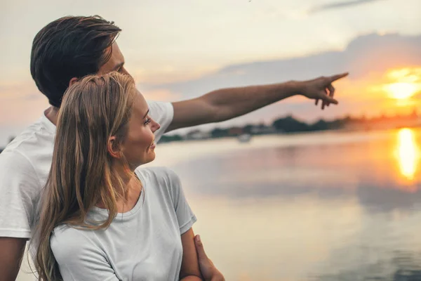 Pleased couple spending time during summer evening — Stock Photo, Image