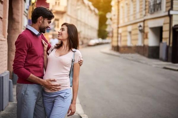 Happy loving couple sharing tender moment on the street — Stock Photo, Image