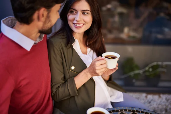 Beautiful loving couple spending time in outdoor cafe — Stock Photo, Image