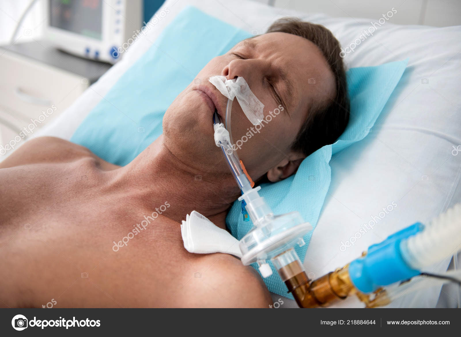 https://st4.depositphotos.com/4232343/21888/i/1600/depositphotos_218884644-stock-photo-patient-on-mechanical-ventilation-lying.jpg