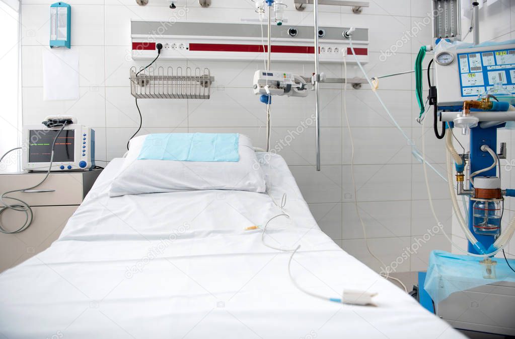 Hospital room in white tones with modern medical equipment