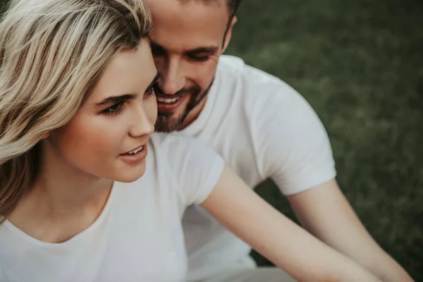 Joyful couple with pleasure spending time together — Stock Photo, Image