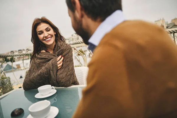 Couple in love is drinking coffee on terrace — Stock Photo, Image