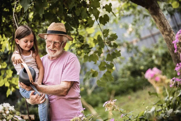 Grandparent with his grandchild spending time together in countryside Royalty Free Stock Images