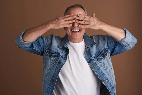 Waist up of the adult man having fun and closing his eyes — Stock Photo, Image