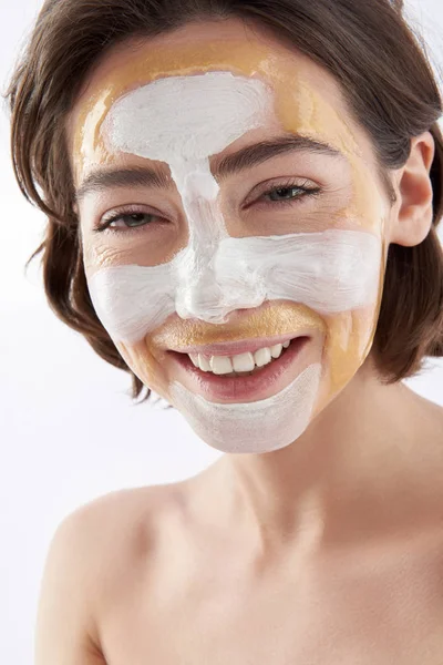 Happy smiling pretty woman with face mask — Stock Photo, Image