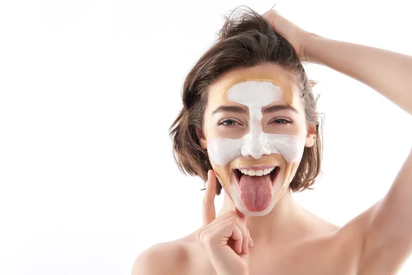 Portrait of happy funny female with face mask — Stok Foto