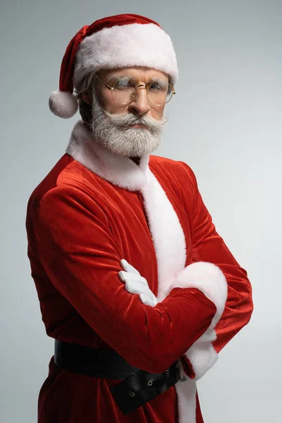 Santa Claus standing with crossed hands on chest — Stock Photo, Image