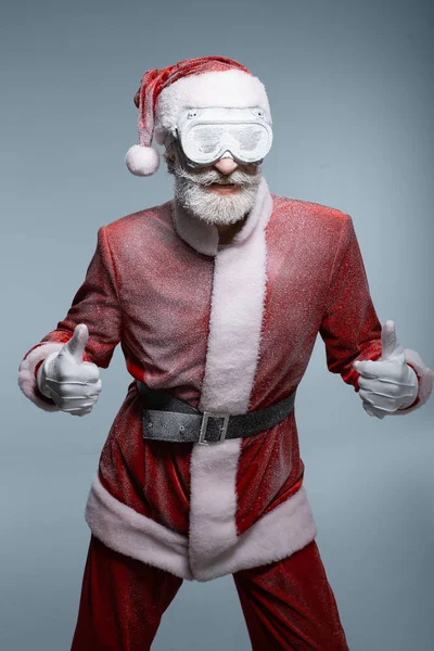 Elderly Santa Claus smiling and showing thumbs up — Stock Photo, Image