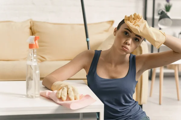 Young female exhausted after housework stock photo — Stock Photo, Image