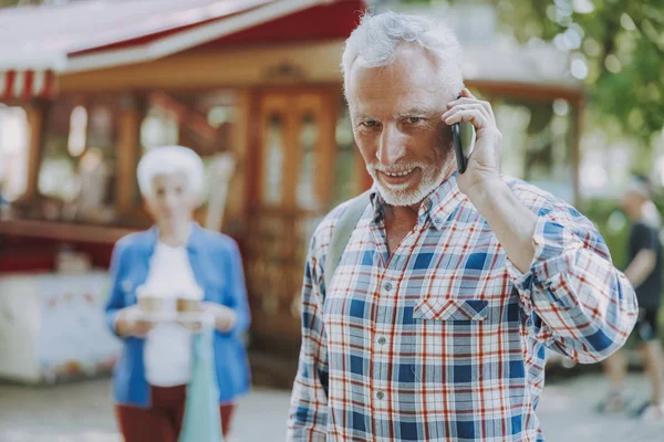 Confident mature man talking on the phone stock photo — Stock Photo, Image