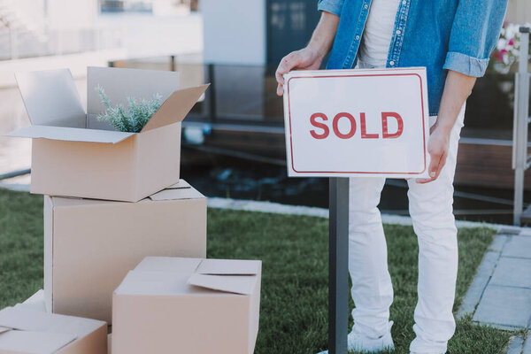 Close up of sign near the house